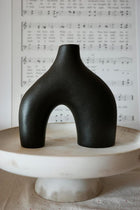 Carrot's Den Black ceramic donut vases - Set of 2. Minimalist Nordic decor for home, office & wedding centerpieces. Modern hollow design perfect for plants & flowers.