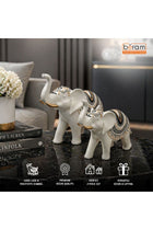 Beram Royal White Elephant Figurines Set of 2 Large and Small Resin Statues with Gold Accents Lucky Trunk Up Décor for Home Office and Living Room Bedroom Shelf Tabletop Gift Luxury Decor