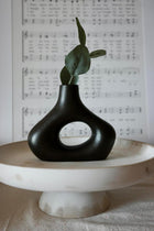 Carrot's Den Black ceramic donut vases - Set of 2. Minimalist Nordic decor for home, office & wedding centerpieces. Modern hollow design perfect for plants & flowers.
