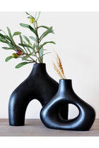 Carrot's Den Black ceramic donut vases - Set of 2. Minimalist Nordic decor for home, office & wedding centerpieces. Modern hollow design perfect for plants & flowers.