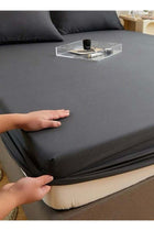 Fitted bed sheet 90*200+30 cm with 2 pillow covers, set of 3 pieces, plain black color.