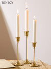 DUNISO A set of three golden candle holders, used for decorating cone-shaped candle holders with anti slip bases, suitable for weddings, dinners, and parties