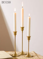 DUNISO A set of three golden candle holders, used for decorating cone-shaped candle holders with anti slip bases, suitable for weddings, dinners, and parties
